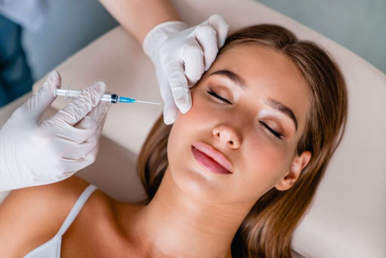 young-woman-gets-beauty-facial-injections-salon